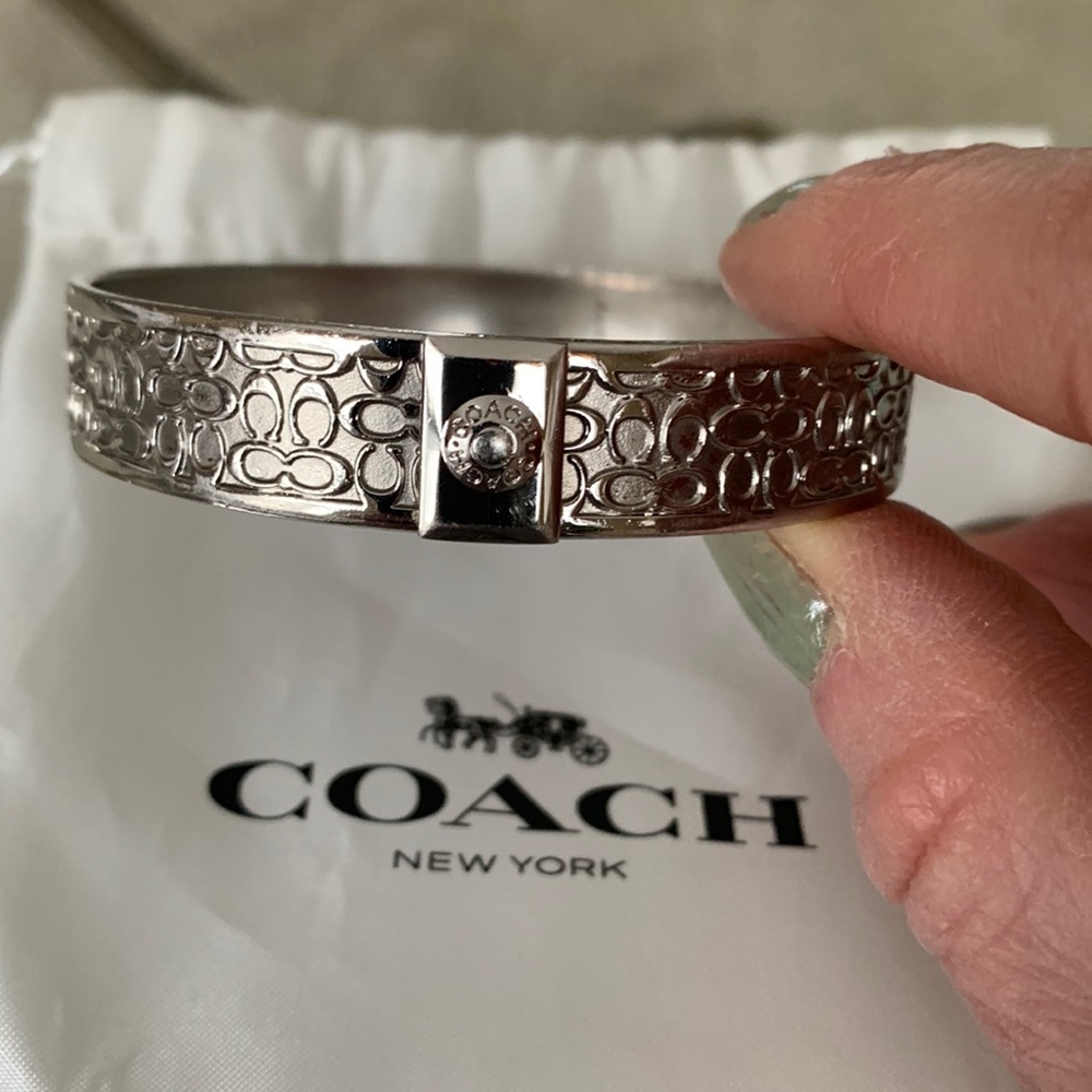 COACH Signature “C” 1/2 inch bangle bracelet- Silver.
